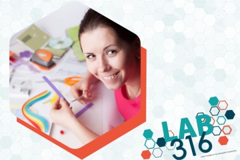 photo of woman holding scissors and crafting over a blue hexagonal background with the LAB 316 logo