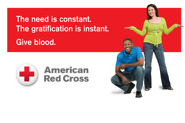 african american man and white woman promoting blood donations to the red cross